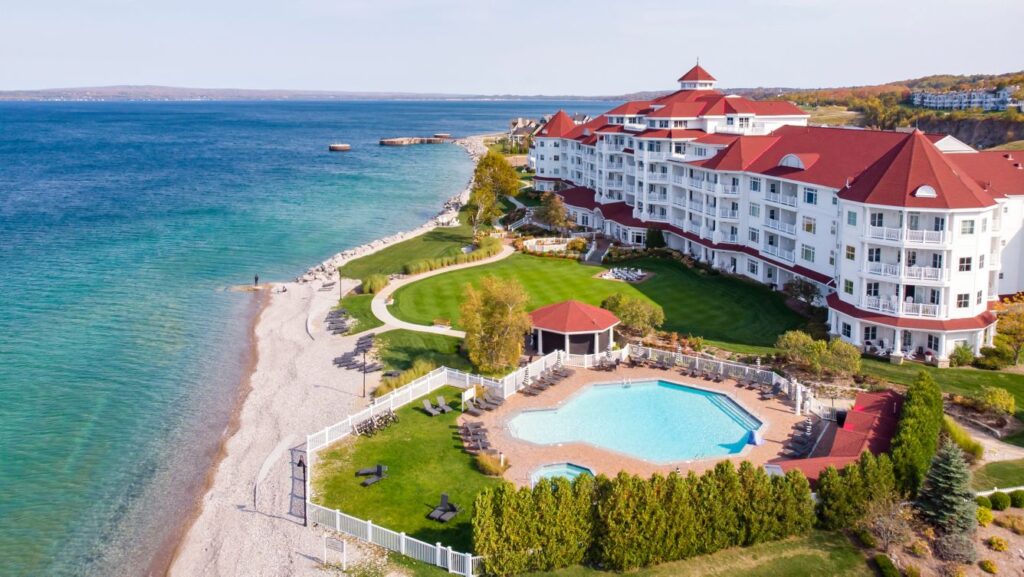 Drone of the Inn at Bay Harbor with Lake Michigan and the resort pool