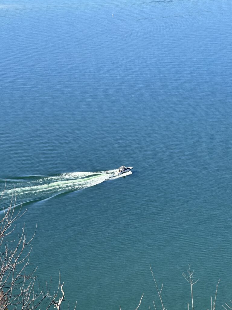 Aerial view of a surfer on Lake Austin