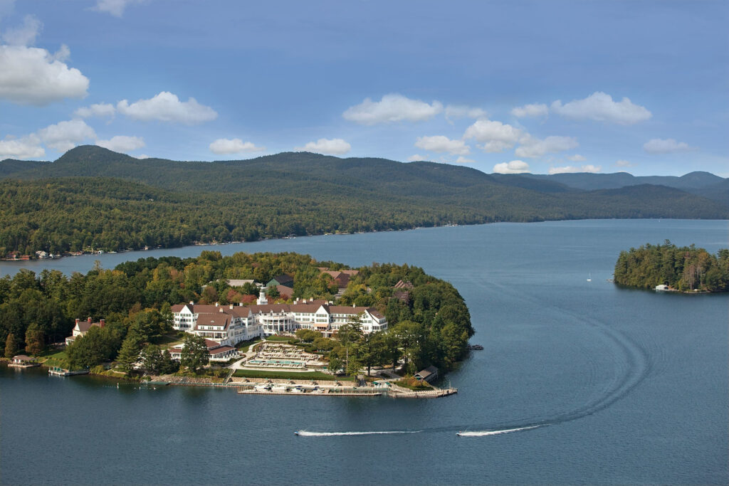 Sagamore resort Aerial View with boats driving around the point