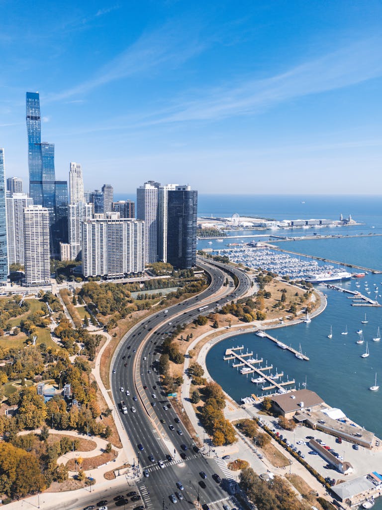 Stunning aerial view of Chicago skyline and Lake Michigan waterfront on a sunny day.