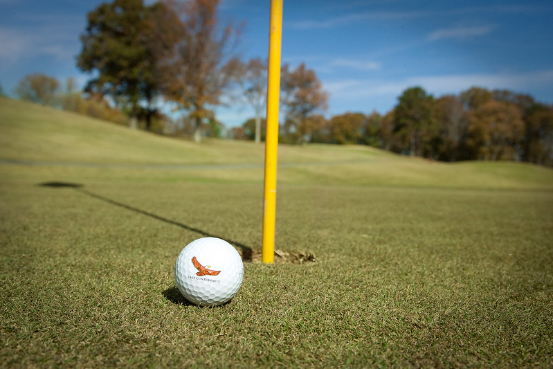 Golf Ball next to hole on Green at Gunters Landing Golf Course