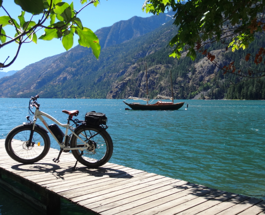 E-bike sitting on a dock along the shore of Lake Chelan