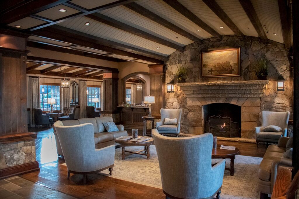 Lake Lanier Resort Lodge Lobby with chairs in front of a fireplace